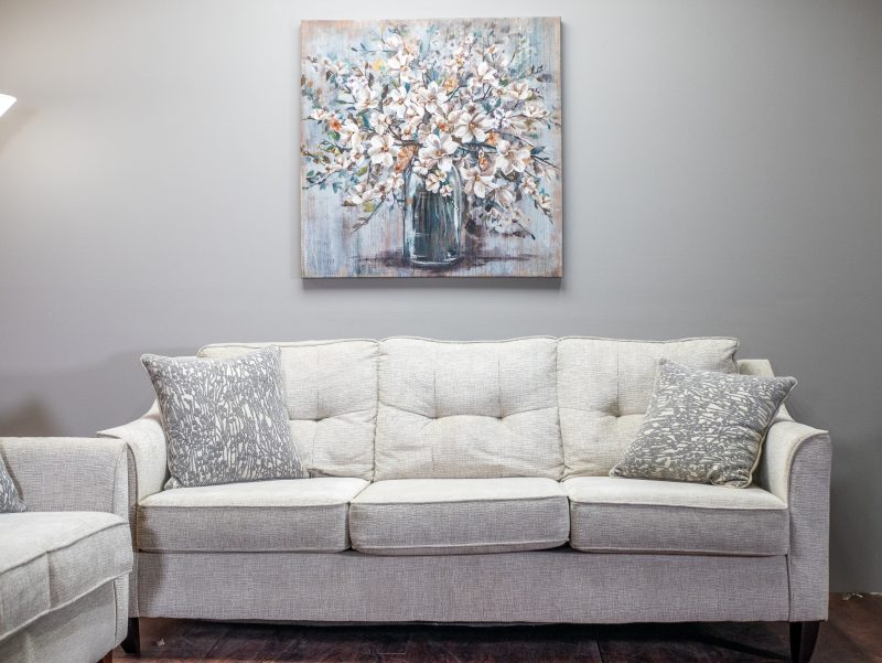 Gray couch with marbled pillows
